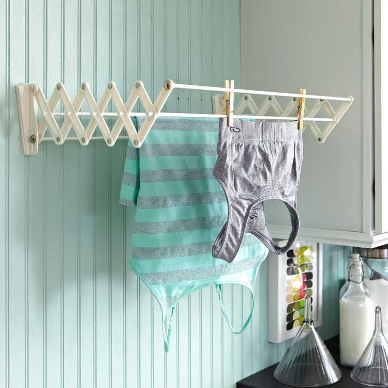 secado de ropa al aire libre en estante de pared expandible