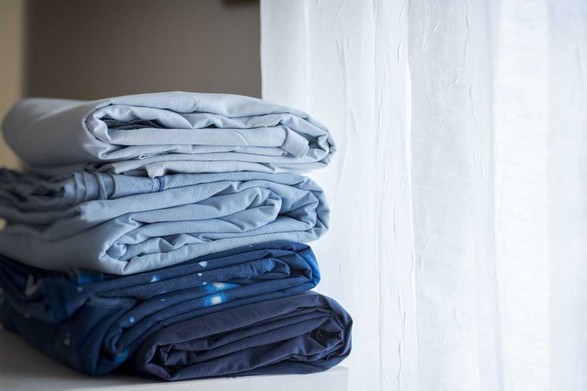 Bör du tvätta nya lakan innan du använder dem?