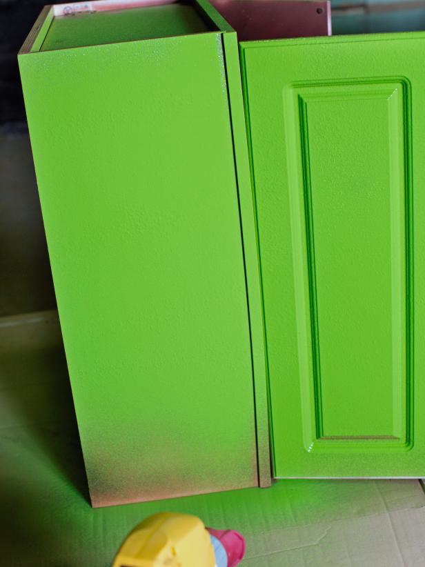 CI-Brian-Flynn_spraying-paint-green-painting-wall-cabinet_s3x4